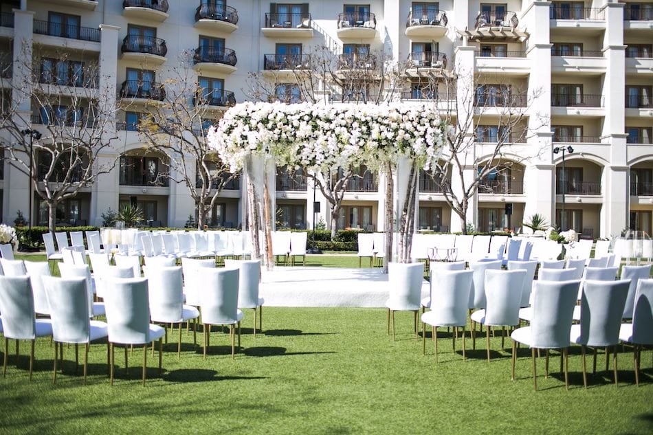 Outdoor Monarch Beach Resort Wedding Ceremony Featured in Inside Weddings