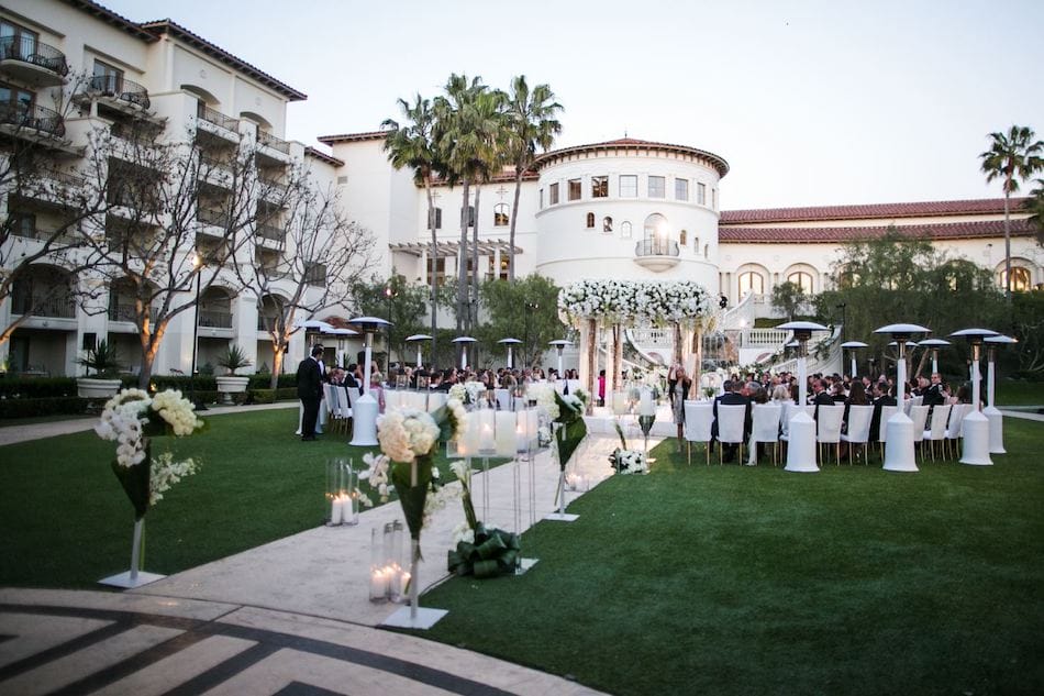 Outdoor Monarch Beach Resort Wedding Ceremony Featured in Inside Weddings